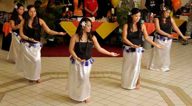 Members of the Misawa Islanders perform a hula dance